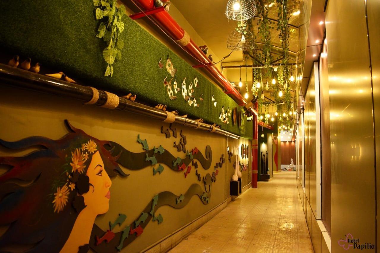 Hotel Papilio Māldah Buitenkant foto